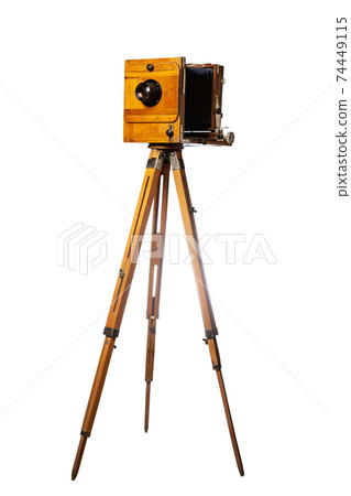 vintage photo camera on tripod isolated on white background vintage photo camera on tripod isolated on white background 74449115