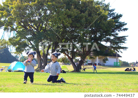 Children playing in the park 74449437