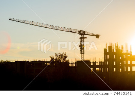building construction site and crane in deep evening building construction site and crane in deep evening 74450141