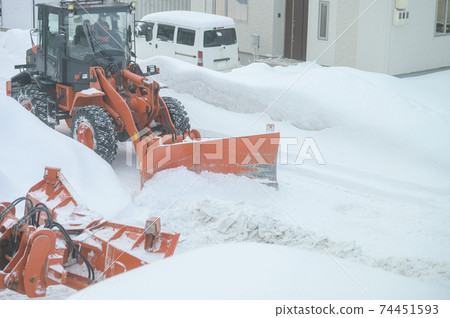 Snow removal work Snow removal work 74451593