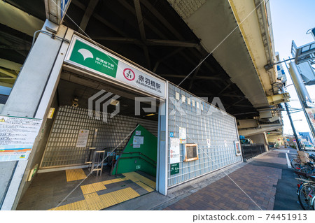 View of Japan's Tokyo cityscape, such as "Toei Subway Akabanebashi Station" (entrance) under the overpass View of Japan's Tokyo cityscape, such as "Toei Subway Akabanebashi Station" (entrance) under the overpass 74451913