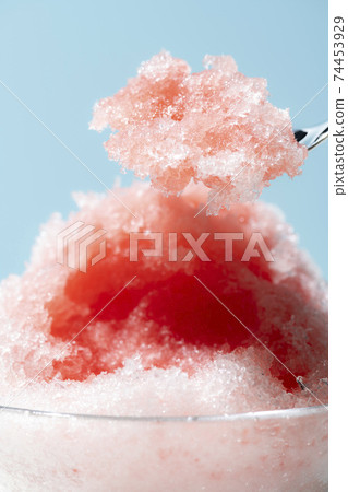 Fluffy shaved ice light blue background Fluffy shaved ice light blue background 74453929
