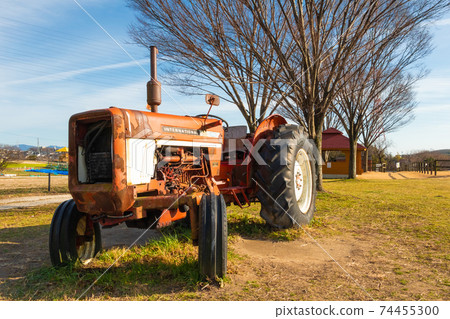 Aichi Ranch, landscape with a tractor <Nisshin City, Aichi Prefecture> Aichi Ranch, landscape with a tractor <Nisshin City, Aichi Prefecture> 74455300
