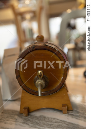 Small oak wine barrel on vintage background, food and drink 74455541