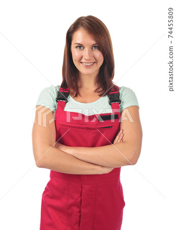 Young woman in red jumpsuit , isolated on white . 74455809