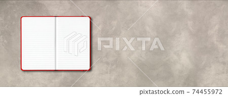 Red open lined notebook isolated on concrete background. Horizontal banner 74455972