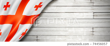 Georgian flag on old white wall banner 74456057