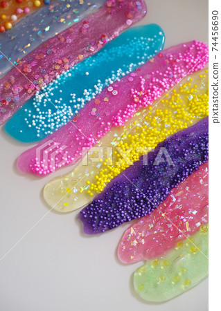 How to make fluffy slime at home, close up view. How to make fluffy slime at home, close up view. 74456690