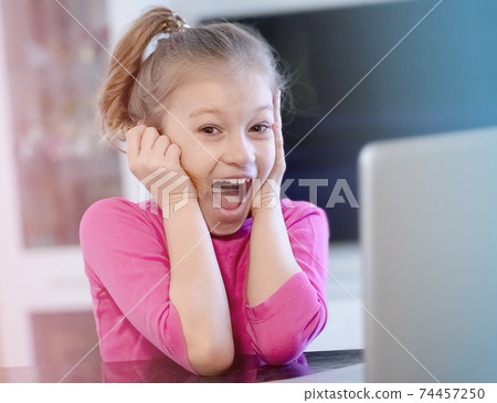 Coronavirus home school concept, quarantine. Girl doing homework. Coronavirus home school concept, quarantine. Girl doing homework. 74457250