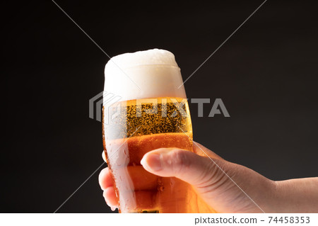 A beer toast 74458353