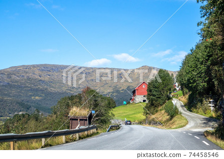 Drive Norway route. Summer green blight sunny day Drive Norway route. Summer green blight sunny day 74458546