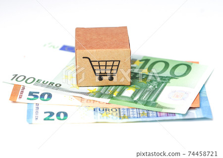 Shopping cart logo on box with Euro banknotes background Shopping cart logo on box with Euro banknotes background 74458721