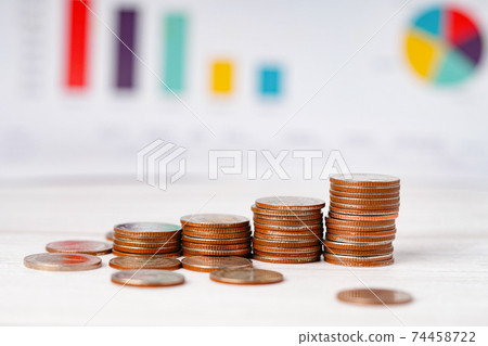 Saving stack coins money Charts and Graphs spreadsheet paper. Finance, Account, Statistics, Analytic research data economy, Stock exchange trading and Business company meeting concept. Saving stack coins money Charts and Graphs spreadsheet paper. Finance, Account, Statistics, Analytic research data economy, Stock exchange trading and Business company meeting concept. 74458722