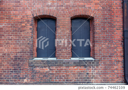 Old red brick walls and closed windows 74462109