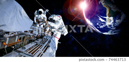 Astronaut spaceman do spacewalk while working for space station Astronaut spaceman do spacewalk while working for space station 74463713