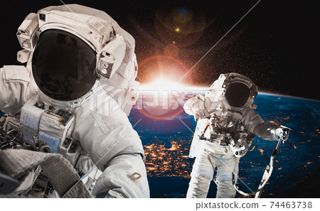 Astronaut spaceman do spacewalk while working for space station Astronaut spaceman do spacewalk while working for space station 74463738