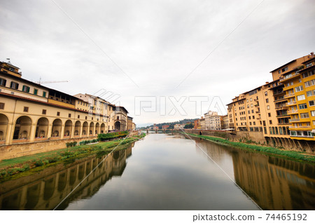 The Uffizi Gallery and the Arno River taken from the Ponte Vecchio bridge on the Arno River in Florence Italy The Uffizi Gallery and the Arno River taken from the Ponte Vecchio bridge on the Arno River in Florence Italy 74465192
