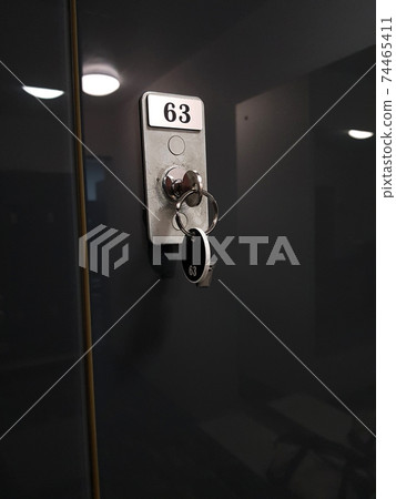 Key with a tag in the locker room of the sports club Key with a tag in the locker room of the sports club 74465411