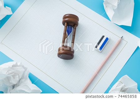 Document paper and hourglass 74465858