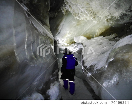 Strolling in a cave in the ice Strolling in a cave in the ice 74466224
