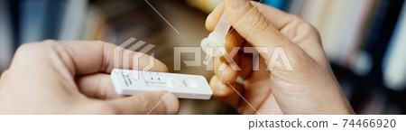 using a covid-19 rapid antigen test, web banner using a covid-19 rapid antigen test, web banner 74466920
