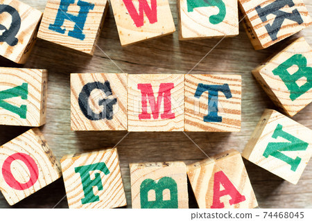 Alphabet letter block in word GMT (abbreviation of Greenwich Mean Time) with another on wood background Alphabet letter block in word GMT (abbreviation of Greenwich Mean Time) with another on wood background 74468045