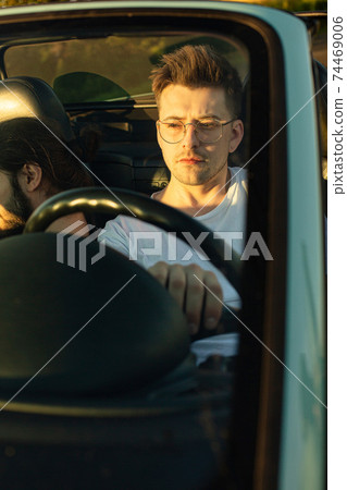 White european boy in the car 74469006