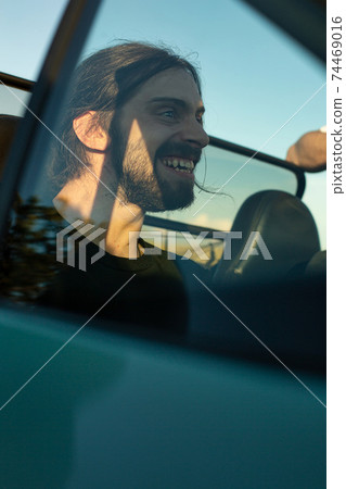 White european boy in the car White european boy in the car 74469016