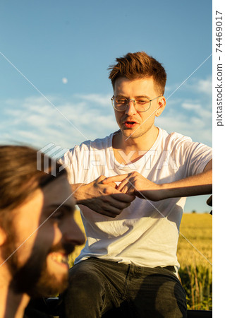 White european boys in the car White european boys in the car 74469017