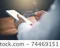 Close up of women's hand using cellphone or mobile for shopping online or payment with credit card.Shopping online concept. 74469151