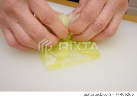 Making cabbage rolls Making cabbage rolls 74469269