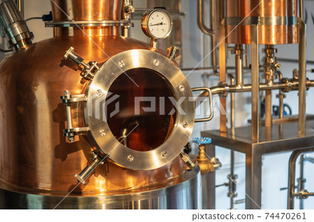 Copper vacuum still for distillation performed under reduced pressure for gin production Copper vacuum still for distillation performed under reduced pressure for gin production 74470261