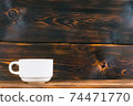 tea cup on rustic wooden table 74471770