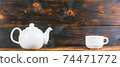 tea cup and pot on rustic wooden table, panoramic shot 74471772