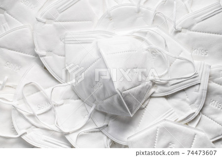 KN95 face mask. FFP2 mask as covid-19 protection. Coronavirus mask KN95 face mask. FFP2 mask as covid-19 protection. Coronavirus mask 74473607