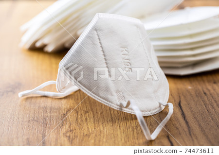 KN95 face mask. FFP2 mask as covid-19 protection. Coronavirus mask 74473611
