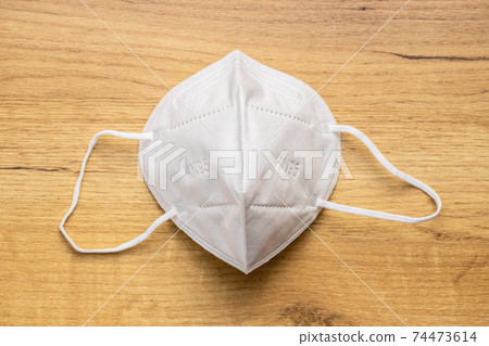 KN95 face mask. FFP2 mask as covid-19 protection. Coronavirus mask 74473614