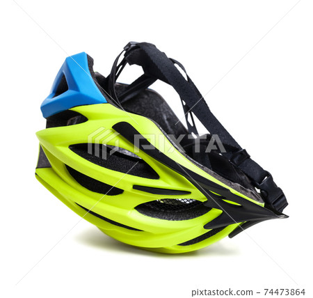 Multicolor bicycle helmet upside down on white 74473864