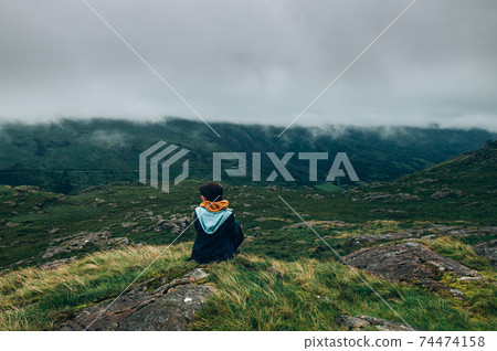 Young woman in Snowdonia National Park in North Wales, UK 74474158