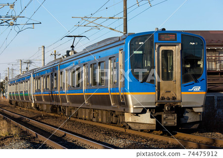Train running on the railroad track_Sendai Airport Access Line_SAT721 series 74475912