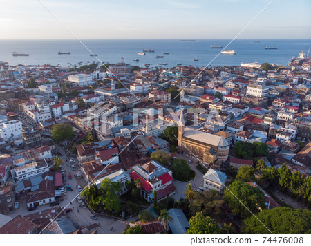 Aerial View on Old Slave Market in Anglican Cathedral at sunset time in Stone Town, Zanzibar, Tanzania 74476008