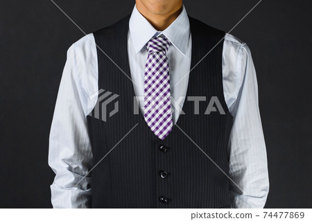Male businessman in a suit 74477869