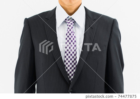 Male businessman in a suit Male businessman in a suit 74477875