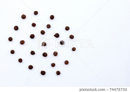 Allspice on white background. Copy space 74478730