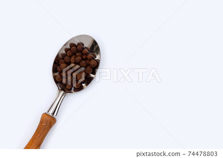 Allspice on white background. Copy space Allspice on white background. Copy space 74478803