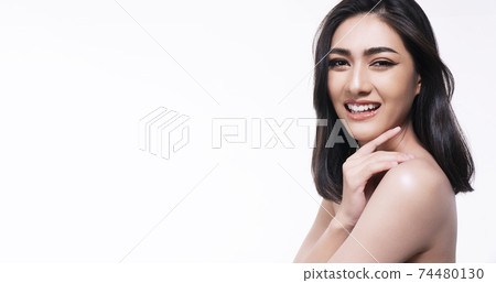 woman touching own face with clear fresh skin. Teenager with perfect treatment skin over isolated 74480130