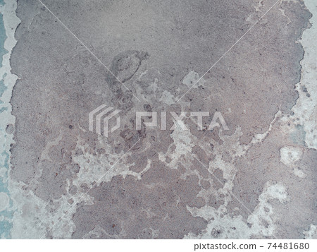 Worn rusty metal surface with paint cracking texture background. 74481680