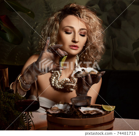 Portrait of beautiful blonde curly hair woman Portrait of beautiful blonde curly hair woman 74481713