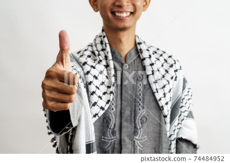 male muslim thumb up 74484952
