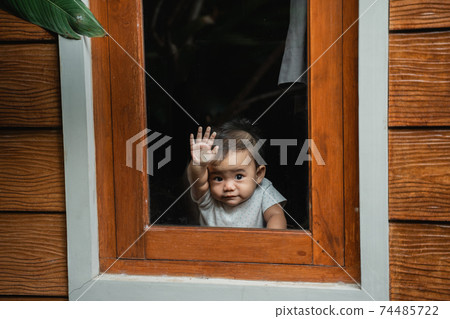 cute asian baby peeking cute asian baby peeking 74485722